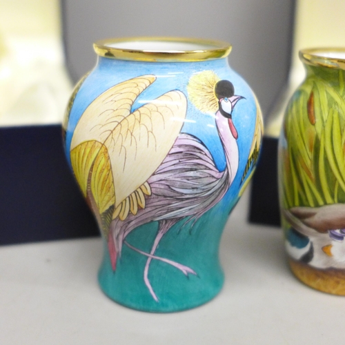 2021 - Two enamelled Moorcroft miniature vases, with mallard and crane detail, boxed