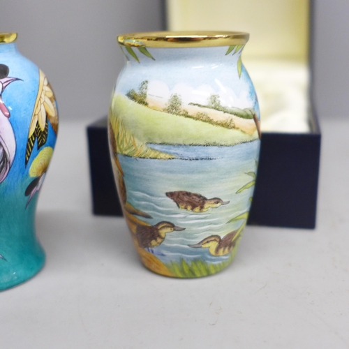 2021 - Two enamelled Moorcroft miniature vases, with mallard and crane detail, boxed