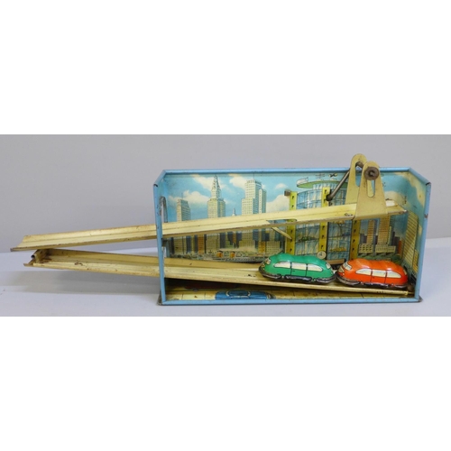 2031 - A Technofix tin-plate clockwork diorama 266 Twin Car Elevator, made in Western Germany