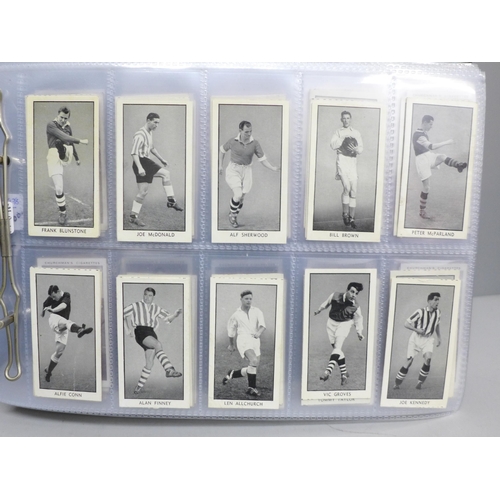 2033 - Cigarette cards; an album of nine complete sets of cigarette/trade cards including Wizard 'Famous Fo... 