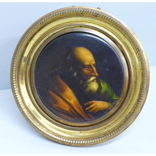 2045 - A 19th Century papier mache hand painted portrait of an elderly man within a gilt metal frame, frame... 