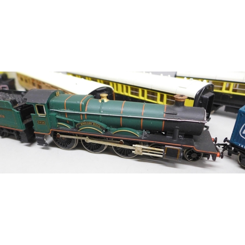 2051 - A collection of Hornby model rail including two locomotives, three carriages and wagons, also two ot... 