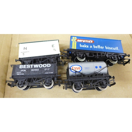 2051 - A collection of Hornby model rail including two locomotives, three carriages and wagons, also two ot... 