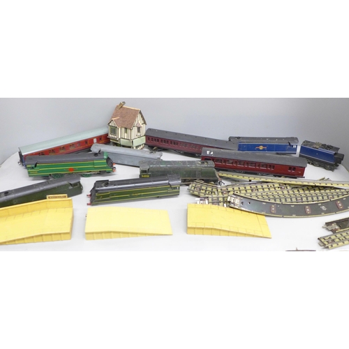 2063 - A collection of Hornby model rail including a locomotive, carriages, building, etc., some a/f