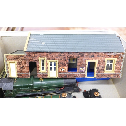 2063 - A collection of Hornby model rail including a locomotive, carriages, building, etc., some a/f