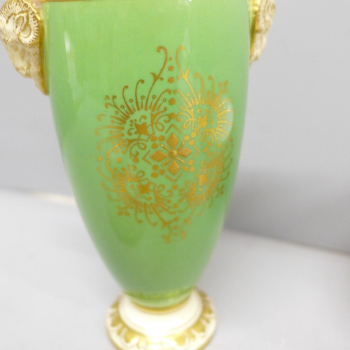 2091 - A Royal Worcester cream and sugar, decorated with roses, a Coalport vase and cover, green ground bas... 