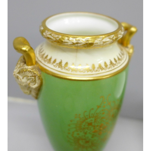 2091 - A Royal Worcester cream and sugar, decorated with roses, a Coalport vase and cover, green ground bas... 