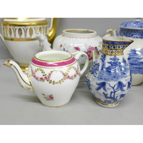 2095 - A Wedgwood Willow pattern tea pot, three other tea pots, two lacking lids and a/f, six jugs, four a/... 