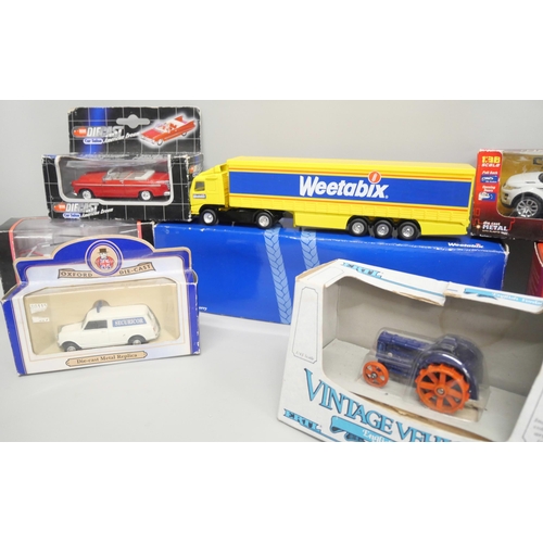 2109 - A collection of seven die-cast model vehicles including Corgi, Dickie Speilzburg, ERTL, Welly and Ox... 