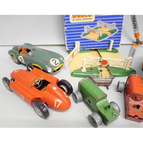 2112 - A collection of model vehicles, Merit plastic racing cars 1950s, Minic clockwork tractors, 1940s, Ho... 