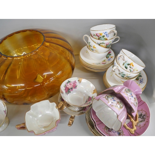 2177 - A box of decorative porcelain tea wares including twelve tea cups and saucers decorated with floral ... 