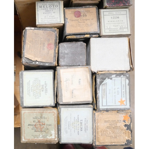 2184 - A collection of approximately sixty-two pianola music rolls to include full scale and eighty-eight n... 