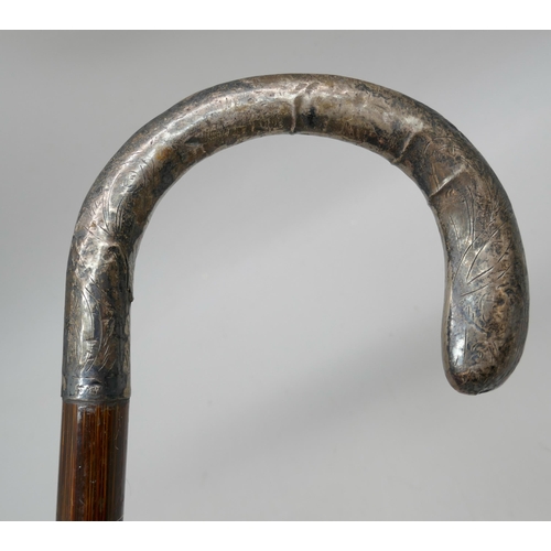 2189 - A silver topped parasol handle