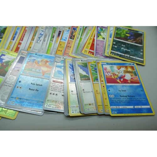 2190 - A collectors Pokémon tin with over 160 holographic cards