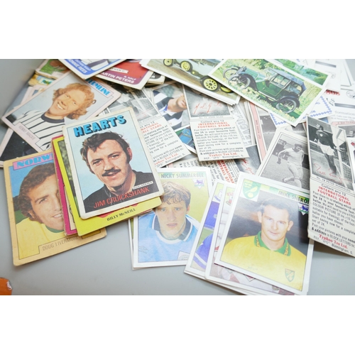 2193 - A collection of football cards and stickers, some autographed, together with enamelled badges