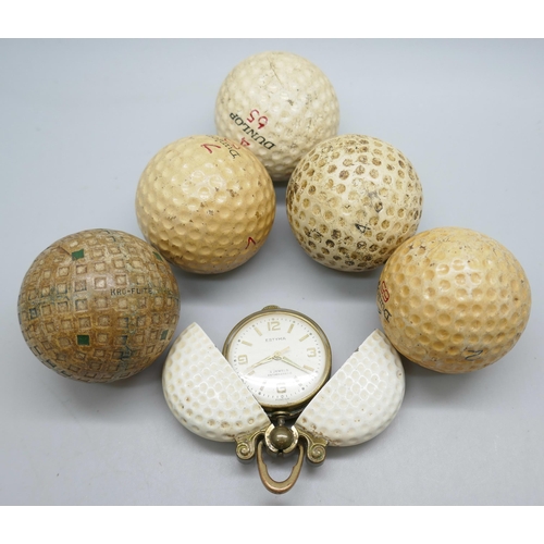 2196 - A German novelty pendant fob watch in the form of a golf ball and five early golf balls