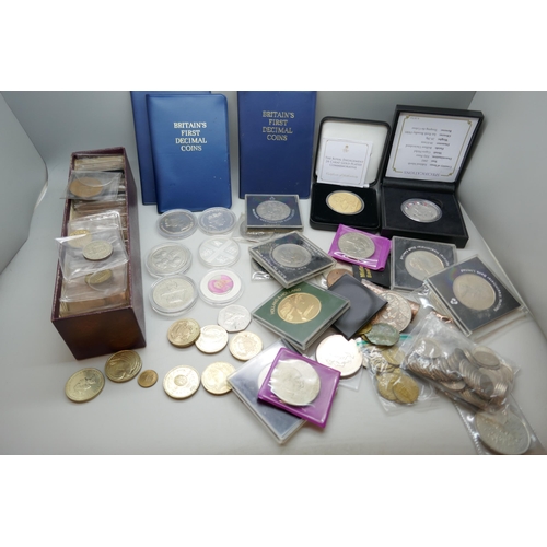 2202 - A collection of coins, commemorative crowns, £2 coins, three First Decimal coin sets, etc.