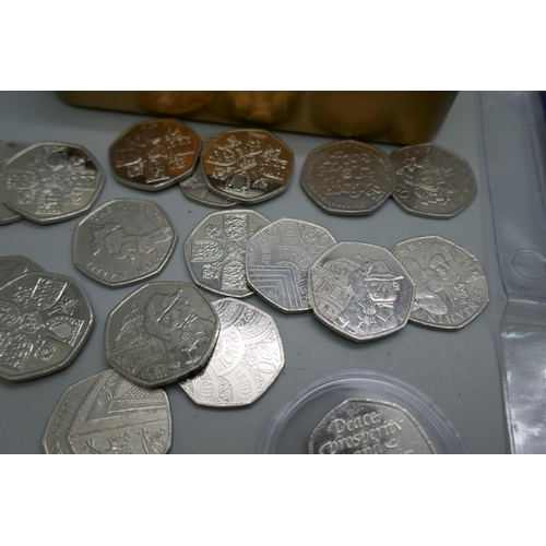 2205 - A collection of thirty-three 50p pieces including Olympics, Pride and Girl Guiding, eight change che... 