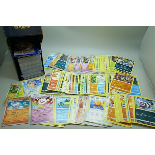 2208 - A collection of over 600 Pokémon cards in collectors box with some holographic