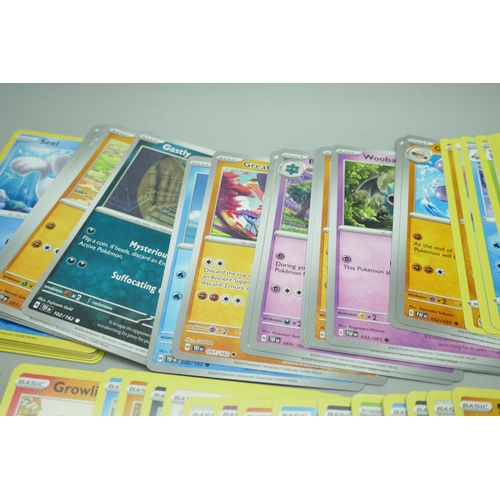 2208 - A collection of over 600 Pokémon cards in collectors box with some holographic