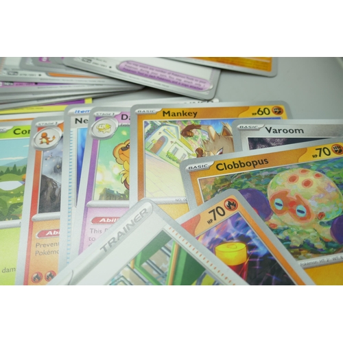 2209 - A collection of 600 Pokémon cards in collectors box with some holographic