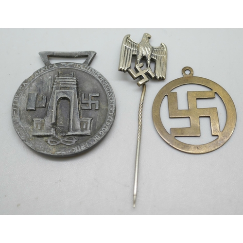 2218 - A German Third Reich medal, a similar pin and a good luck charm