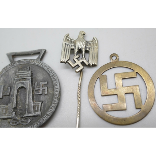 2218 - A German Third Reich medal, a similar pin and a good luck charm