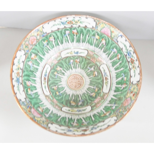 A Chinese famille verte porcelain bowl, decorated with butterflies and ...