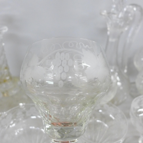 2333 - Glass; a set of six 19th century grape and vine wine glasses, five champagne glasses and a pair of d... 