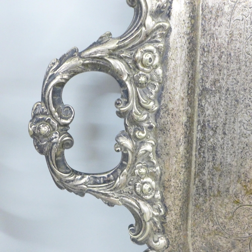 2337 - A large silver plated two handled serving tray with foliate edge **PLEASE NOTE THIS LOT IS NOT ELIGI... 