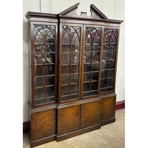 109 - A large Regency style inlaid mahogany breakfront library bookcase