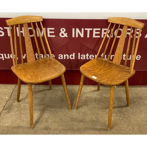 60 - A pair of Scandinavian beech kitchen chairs