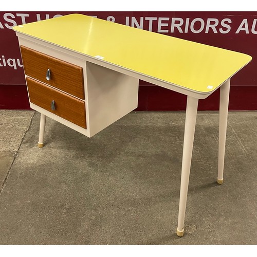 61 - A teak and Formica topped desk