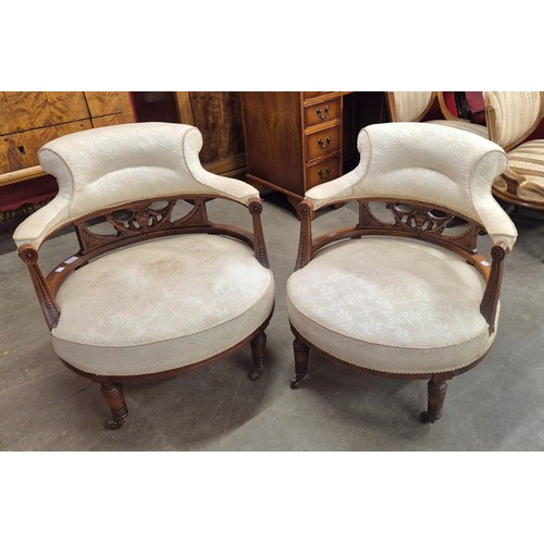 71 - A pair of Victorian mahogany and fabric upholstered tub chairs