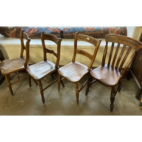 160 - A Harlequin set of four Victorian elm and beech kitchen chairs