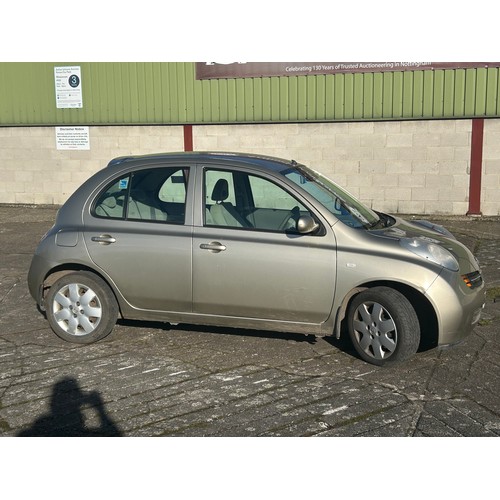 5422 - A 2004 Nissan Micra SE in gold 5 door hatchback car with a 1386cc automatic petrol engine mileage: 6... 