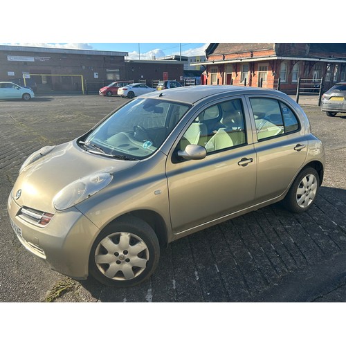 5422 - A 2004 Nissan Micra SE in gold 5 door car with a 1386cc automatic petrol engine mileage: 65656   FY0... 