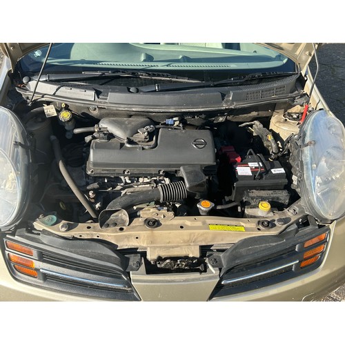 5422 - A 2004 Nissan Micra SE in gold 5 door hatchback car with a 1386cc automatic petrol engine mileage: 6... 