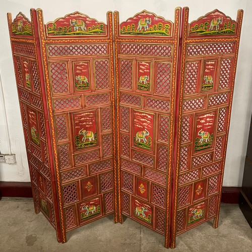 101A - An Indian scarlet painted hardwood folding dressing screen