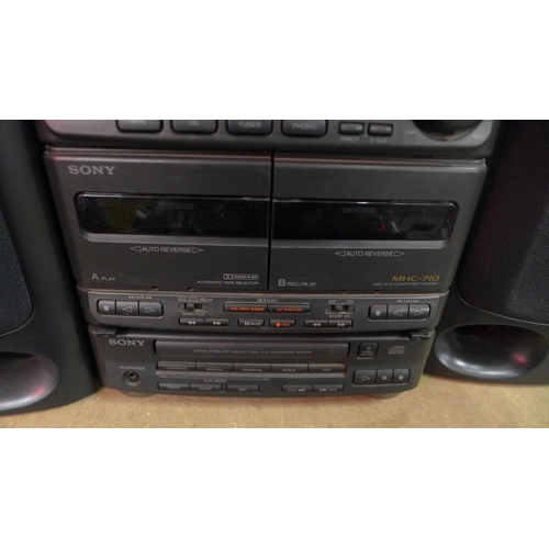 5123 - A quantity of Sony stereo equipment including a Sony MHC-710 mini hi-fi component system and a pair ... 