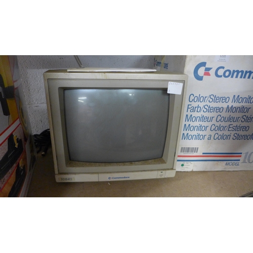 5131 - A Commodore model 1084S colour/stereo monitor with original box and instruction manual