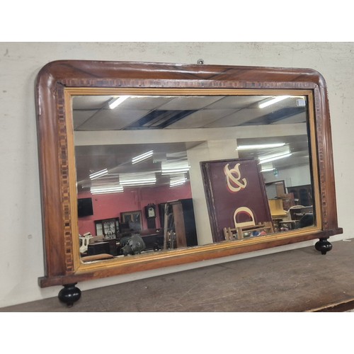 370 - A Victorian inlaid walnut overmantel mirror, a giltframed overmantel mirror, a dressing table mirror... 