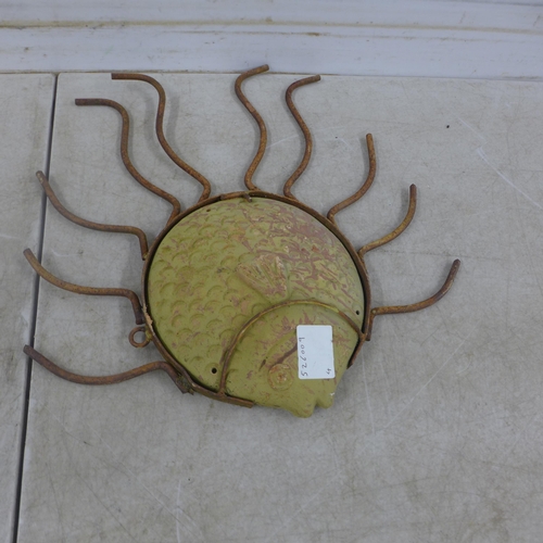5193 - Two wrought iron and clay fish art installations/wall art