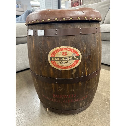 3062 - A 'Becks Light' beer barrel stool with upholstered top