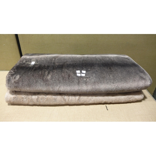 6162 - Two Mon Chat faux fur throws (351-51,52) *This lot is subject to VAT