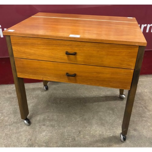 41 - A teak sewing trolley