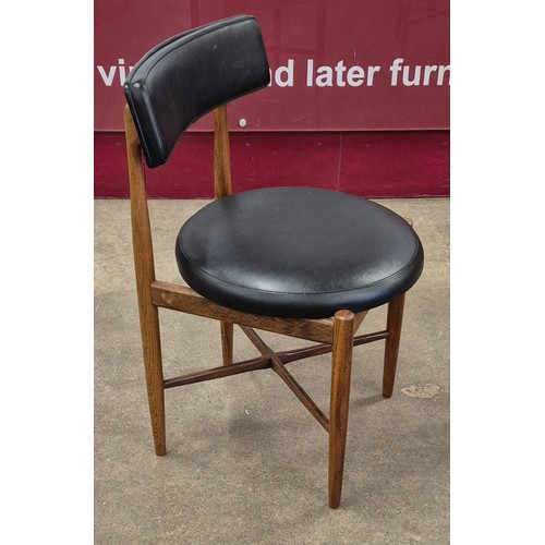 5 - A set of four G-Plan Fresco teak and black vinyl dining chairs