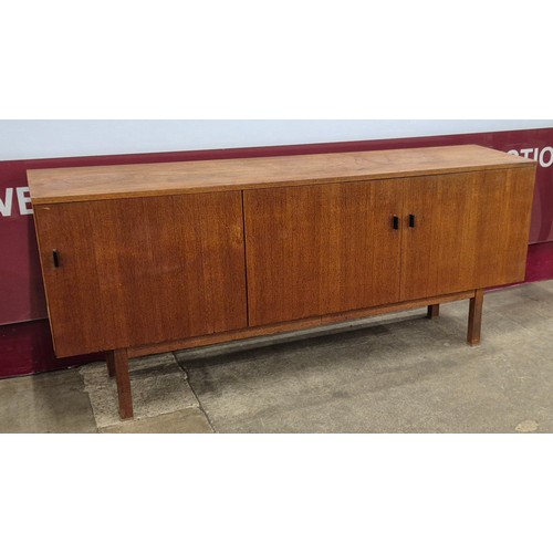 21 - A teak sideboard