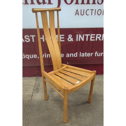 65 - A set of four Ercol Blonde ash Saville dining chairs