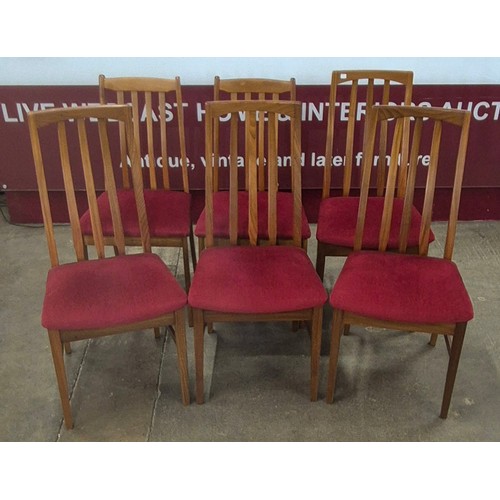 66 - A William Lawrence teak oval extending dining table and six chairs